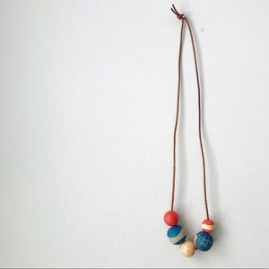 Hand painted wood and leather necklace